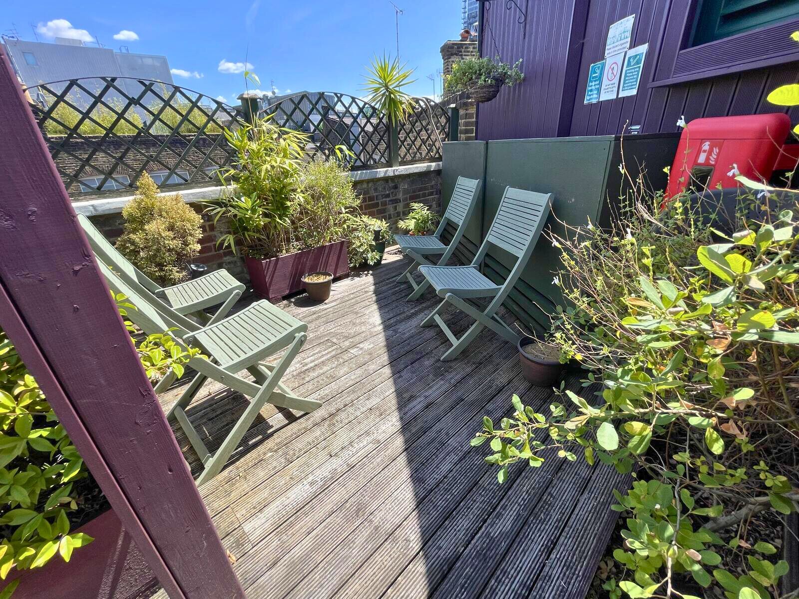 Rooftop event space with planting and seating