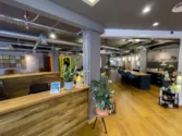 Reception counter with plants in modern event space