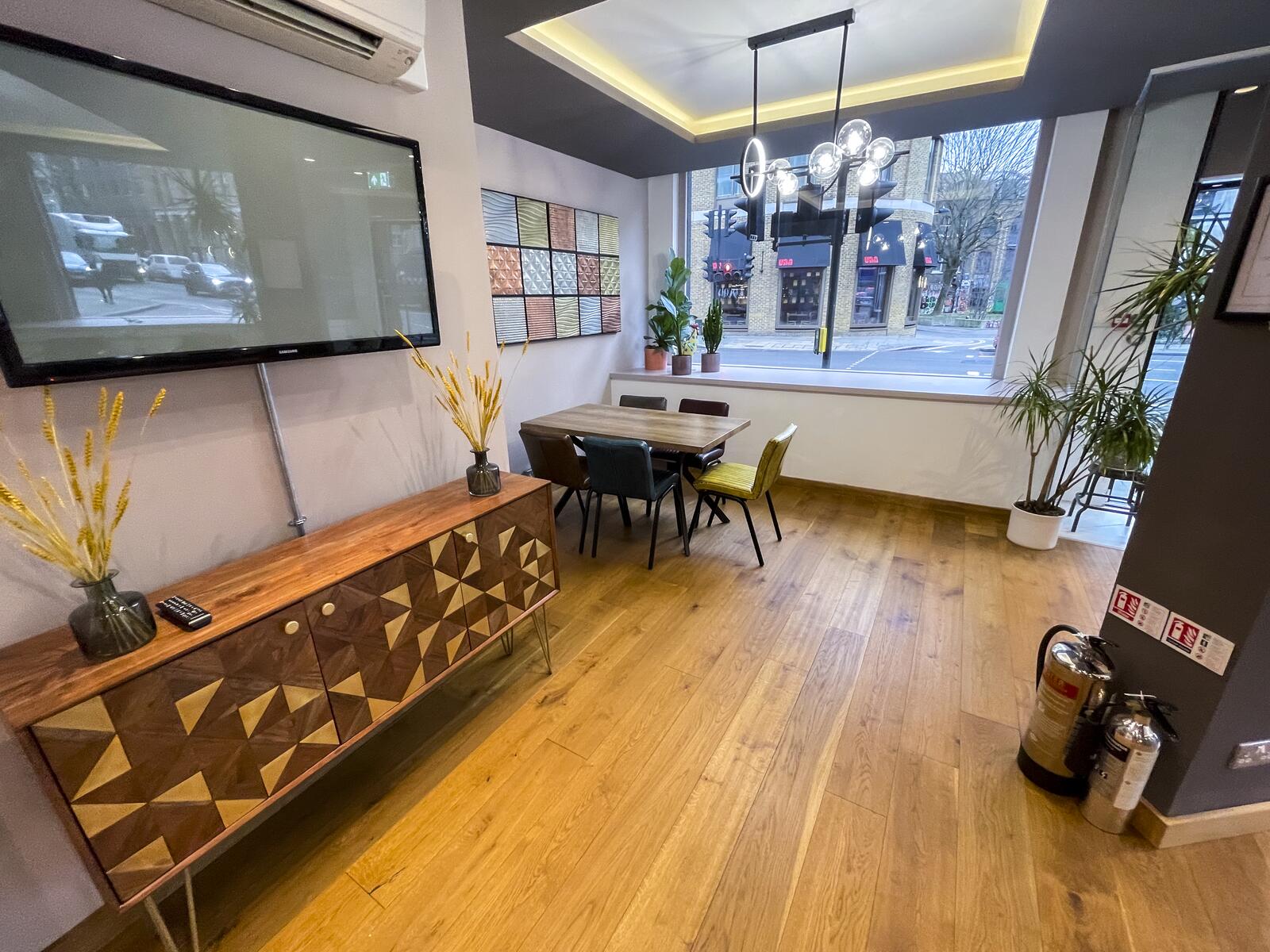 Workspace table by window with natural light in Shoreditch