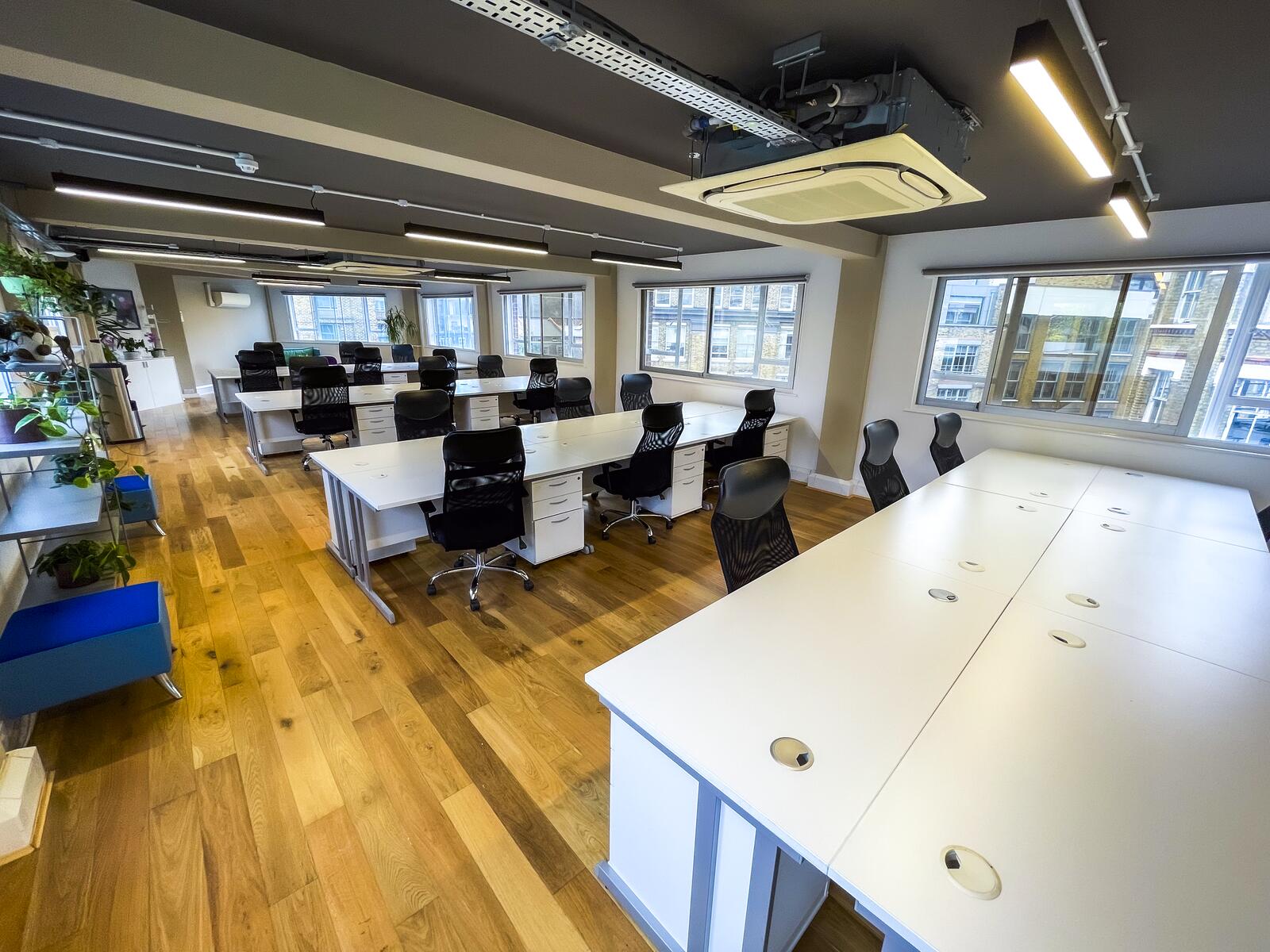 Open workspace with fitted desks at 64 Great Eastern Street