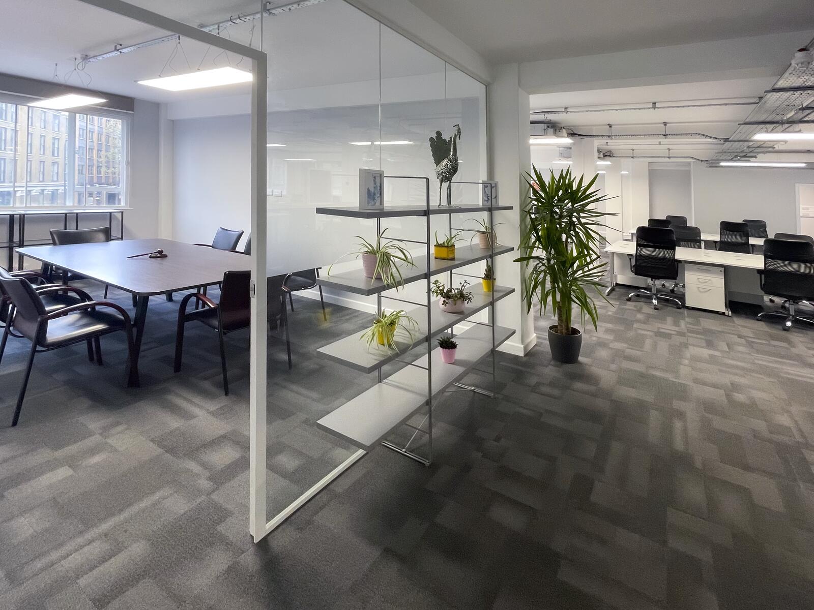 Glass-partition workspace within Shoreditch serviced office
