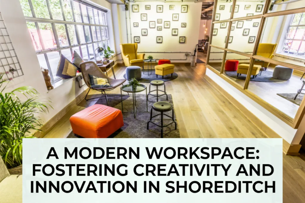 Interior of a modern Shoreditch serviced office with exposed brick, large windows, and indoor plants.